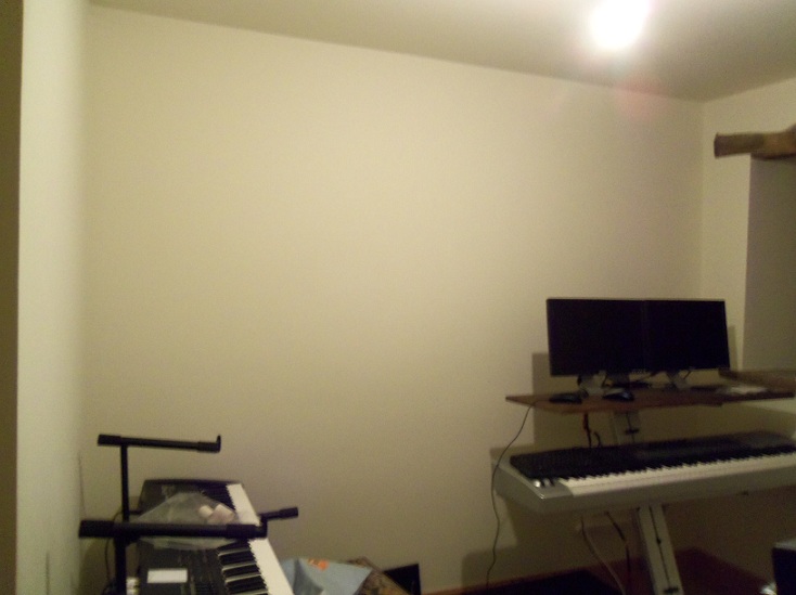 Opposite wall to speakers.jpg